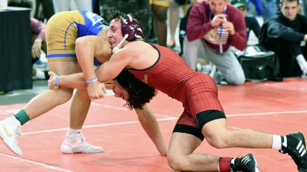 Lake Gibson junior Gianni Maldonado grapples with South Dade junior Gavin Balmeceda during a 152-pound semifinal at the Knockout Christmas Classic this past December at Silver Spurs Arena in Kissimmee. Both wrestlers will be competing at this year's Knockout beginning Thursday.